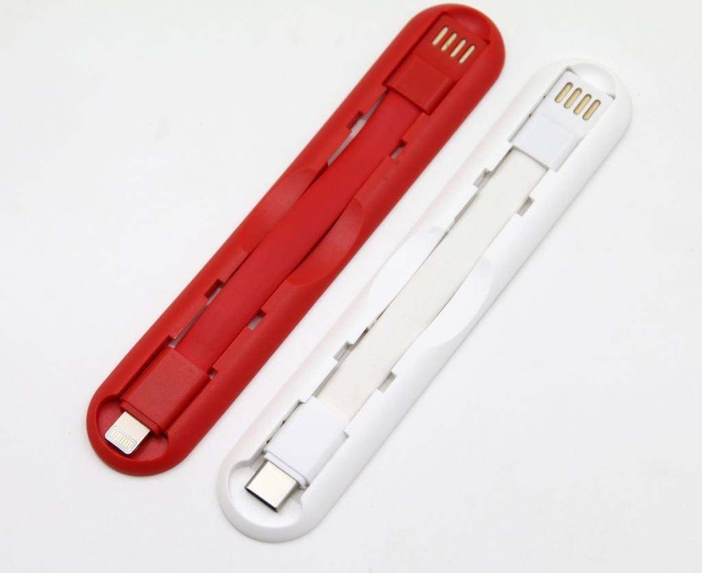 CHARGE N HOLD - Uchwyt do telefonu z kablem do ładowania